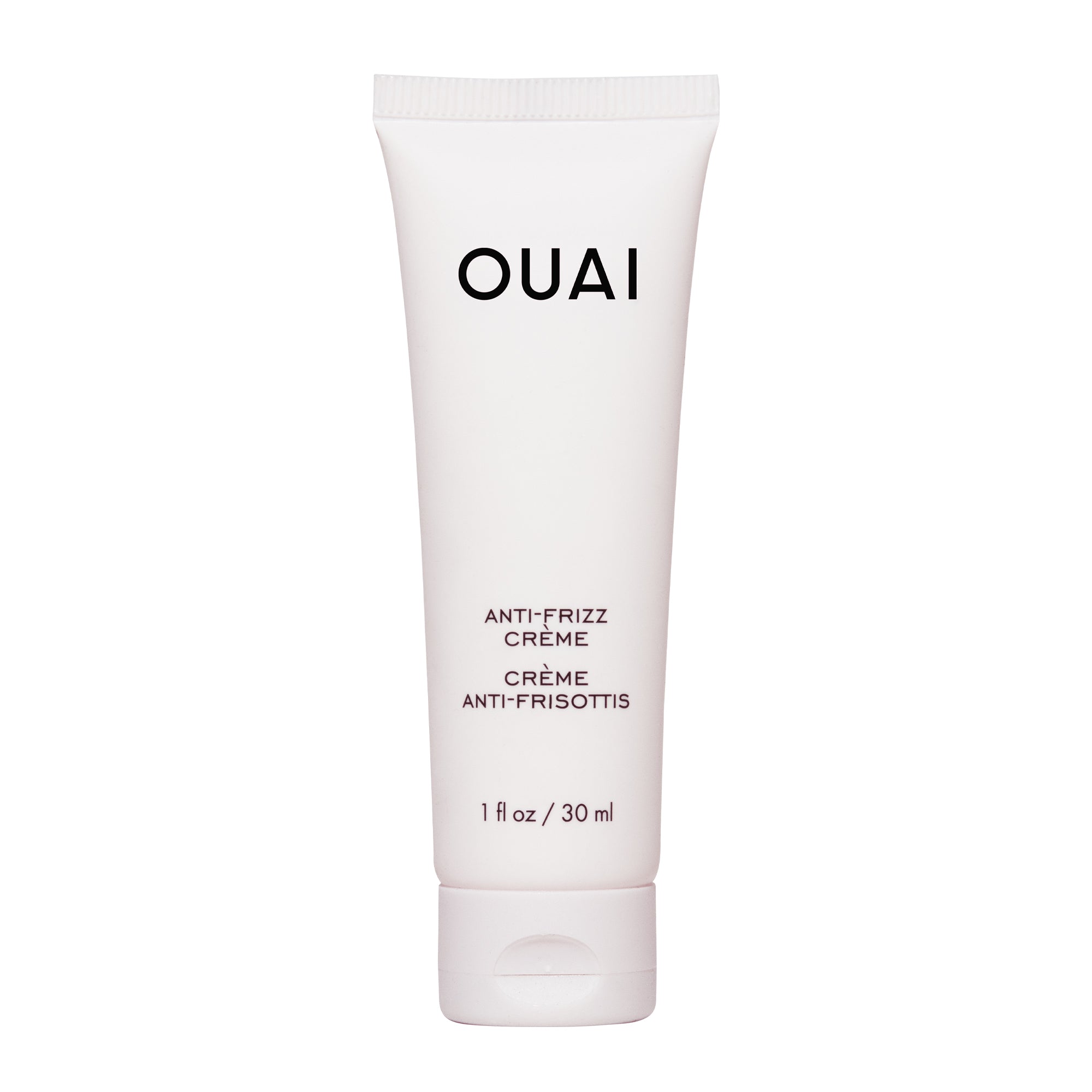 A white tube of OUAI Anti-Frizz Crème, designed for hair care.