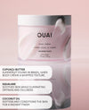 OUAI Melrose Place body creme in a white jar with a lid, set against a soft pink background with product details and descriptions on the left.