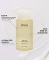 OUAI shampoo bottle with ingredient information on a white background
