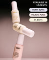 Three OUAI leave-in conditioner bottles stacked diagonally on a gradient background, with text on the right stating 'AVAILABLE IN 3 SCENTS: NORTH BONDI, MELROSE PLACE, ST. BARTS'.