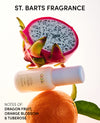 OUAI hair product with dragon fruit and orange on a white background, featuring St. Barts Fragrance branding.