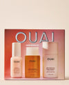 OUAI Hair Repair Kit containing three bottles: Medusa Shine Leave-In Conditioner, Detox Shampoo, and Bond Repair Hair Enhancer, displayed in front of their pink packaging box.