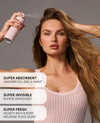 Dry shampoo spray applied to model's flowing hair; super absorbent, invisible, fresh scent.