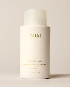 OUAI St. Barts Body Cleanser 300ml white pump bottle on neutral background.