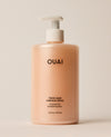 OUAI Thick Hair Shampoo 16 fl oz pump bottle on neutral background