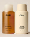 Two OUAI hair care bottles on a light beige background: a metallic amber bottle of detox shampoo and a matte cream bottle of thick hair conditioner.